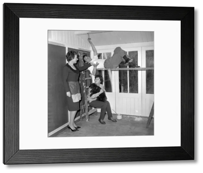 Framed Print : Actor Reg Varney seen here painting with his wife and daughter. Circa 1963