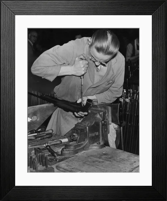 Framed Print : Mechanical Engineer works on a rifle in gun factory, Gun Quarter area of Birmingham, 1950 Framed Print : Mechanical Engineer works on a rifle in gun factory, Gun Quarter area of Birmingham, 1950
