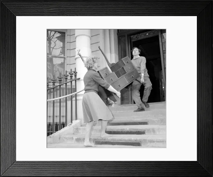 Framed Print : Doreen Bennongton a female furniture remover Circa 1962