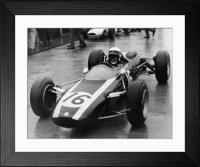 : Jackie Stewart, Cooper B. R. M leaving the pits during a practice race at Silverstone : Jackie Stewart, Cooper B. R. M leaving the pits during a practice race at Silverstone