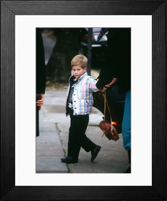 Framed Print : Prince Harry arriving at school where he will be playing a shepherd in a nativity play Framed Print : Prince Harry arriving at school where he will be playing a shepherd in a nativity play