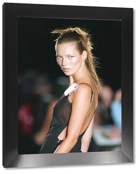 Kate Moss supermodel models Versace during Paris Fashion Week Black dress