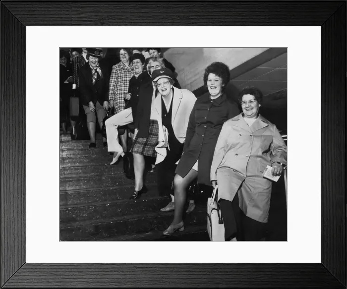 Framed Print : A group of Housewives pose for a picture before leaving Britain for a holiday in Framed Print : A group of Housewives pose for a picture before leaving Britain for a holiday in