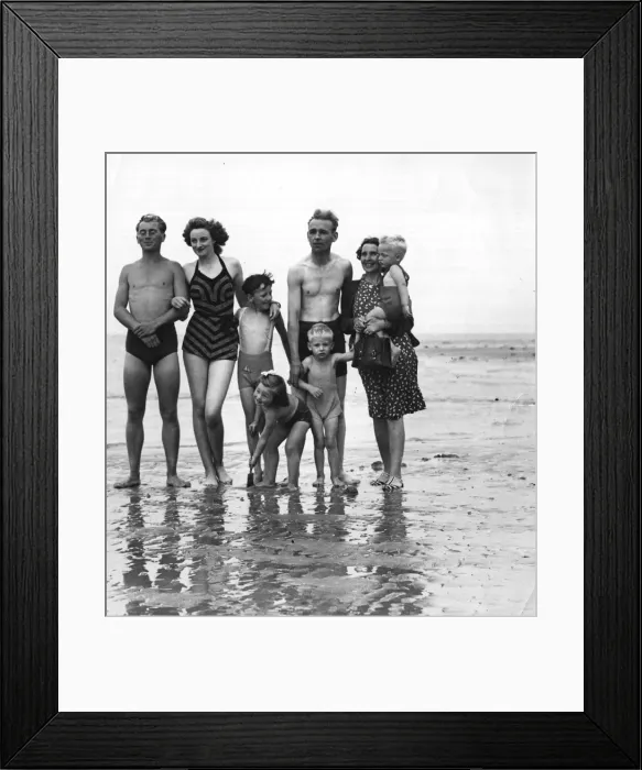 Framed Print : The photograph shows a family on the beach. September 1946 1940s Framed Print : The photograph shows a family on the beach. September 1946 1940s