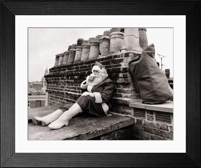 Framed Print : Father Christmas December 1986 Santa sinks a well earned pint as he waits for a Framed Print : Father Christmas December 1986 Santa sinks a well earned pint as he waits for a