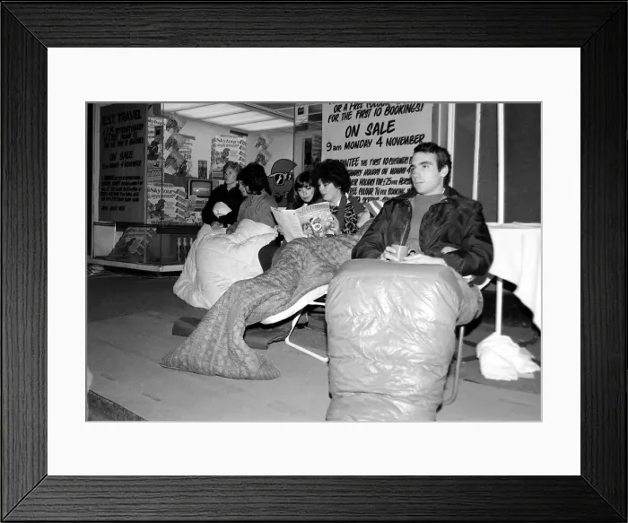 Framed Print : The queue outside ETS Travel Weladstone for £25 Thomson holidays November