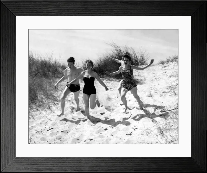 Framed Print : Seaside - running in the sand Friends chasing each other at the beach in Ostend Framed Print : Seaside - running in the sand Friends chasing each other at the beach in Ostend
