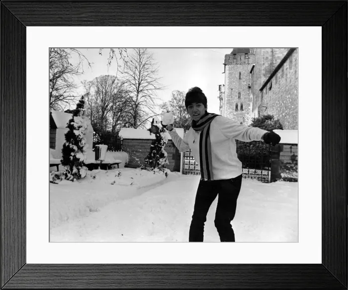 Framed Print : Miss Non Watcyn Owen of Llandaff, Cardiff enjoying some snowballing outside Cardiff