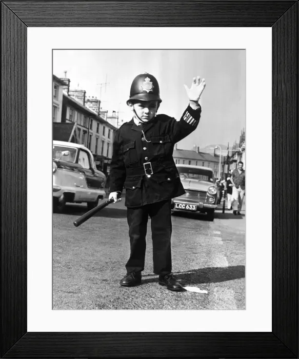 Framed Print : Clive Roberts of Portmadoo, North Wales was given the uniform at Christmas