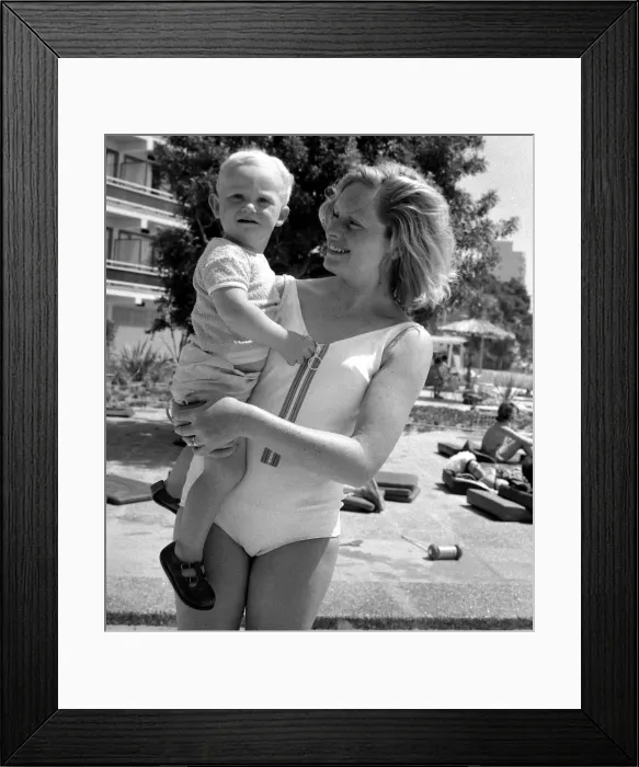 Framed Print : Two year old Gregory Curtis with his mother Jill on holiday in Majorca beside the pool Framed Print : Two year old Gregory Curtis with his mother Jill on holiday in Majorca beside the pool
