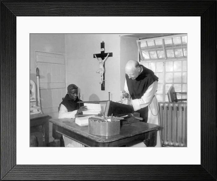 : Father Cyprian, from Nigeria and Father Celsus take care of the binding of the monastery : Father Cyprian, from Nigeria and Father Celsus take care of the binding of the monastery