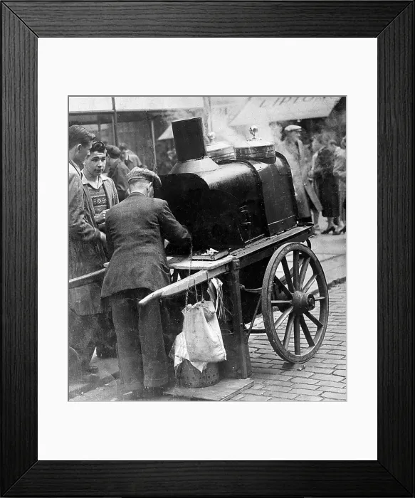 Framed Print : A man selling hot chesnuts on the Newcastle Streets c. 1955 Framed Print : A man selling hot chesnuts on the Newcastle Streets c. 1955