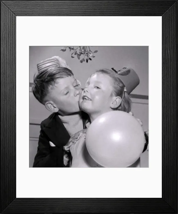 Framed Print : This mistletoe does things for a fellow, thinks seven year old William Smith Framed Print : This mistletoe does things for a fellow, thinks seven year old William Smith