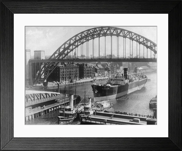 Framed Print : The tug Joffre towing the Cairnvalona under the Tyne Bridge and through the Swing Bridge