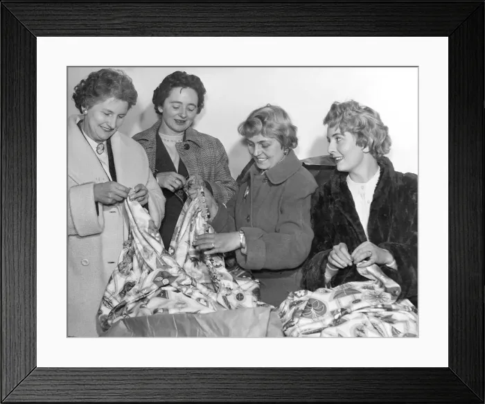 Framed Print : Hungarian Refugees The wives of industrial executives sewing along miles of curtain