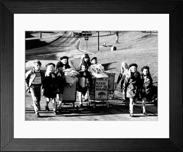 Framed Print : Brownies from Stamfordham, in Northumberland, embark on a clean-up campaign around their Framed Print : Brownies from Stamfordham, in Northumberland, embark on a clean-up campaign around their