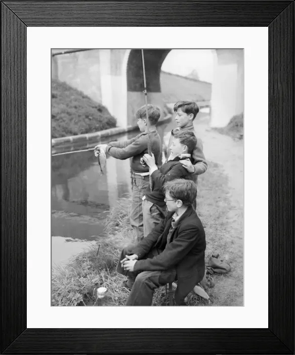 Framed Print : Four young anglers fish at the canal for perch. They are Peter Bethell