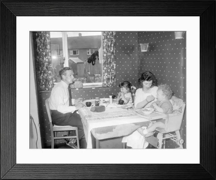 Framed Print : Its tea time and the Eccles family move into the dinette Framed Print : Its tea time and the Eccles family move into the dinette