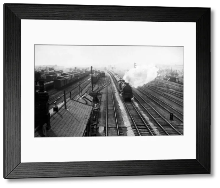 Framed Print : Train-bound passengers, roaring through Bescot on the main line
