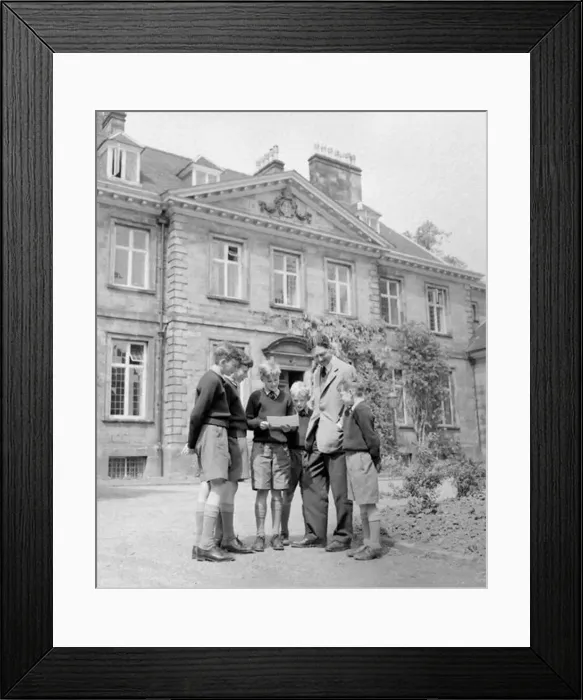 : Boys talk with the headmaster, Rev. A. R. Duncan-Jones at Bishops Palace, part of St : Boys talk with the headmaster, Rev. A. R. Duncan-Jones at Bishops Palace, part of St