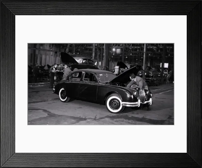 Framed Print : The production line at jaguar or rather what is left after a fire ravaged most of Framed Print : The production line at jaguar or rather what is left after a fire ravaged most of