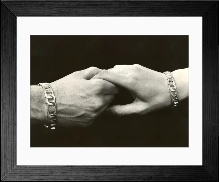 Framed Print : A couple holding hands