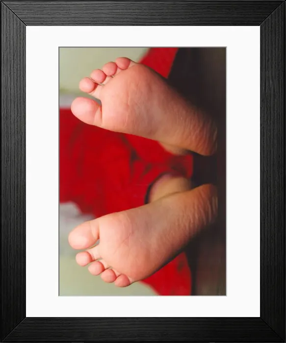 Framed Print : A childs feet before shoes have been worn Framed Print : A childs feet before shoes have been worn