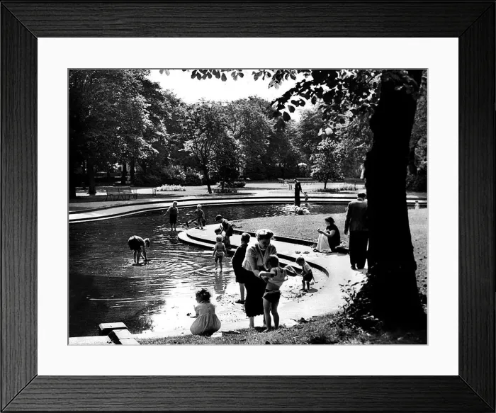 Framed Print : Time to get dressed, but there is still the odd boat to be launched in Brandling Park Framed Print : Time to get dressed, but there is still the odd boat to be launched in Brandling Park