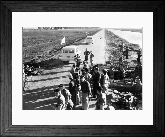 Framed Print : The Suez crisis -part of the convoy of United Nations jeeps, carrying white flags Framed Print : The Suez crisis -part of the convoy of United Nations jeeps, carrying white flags