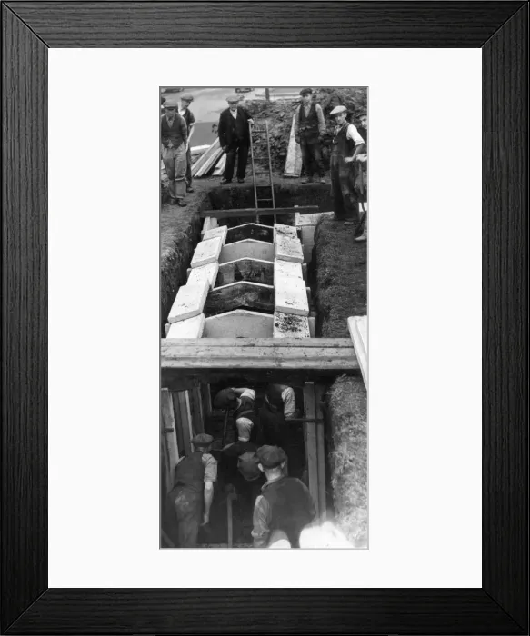 Framed Print : A concrete air raid shelter being constructed in Saville Place, Newcastle Framed Print : A concrete air raid shelter being constructed in Saville Place, Newcastle