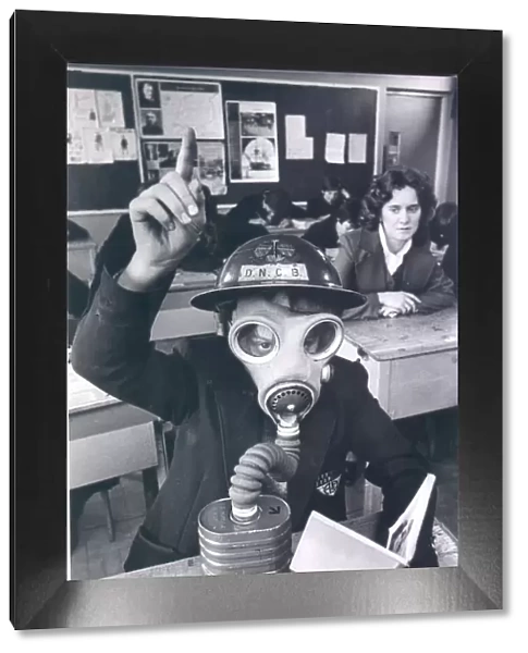 Barry Ingham of Ashington High School wearing a World War Two gas mask, March 27, 1981