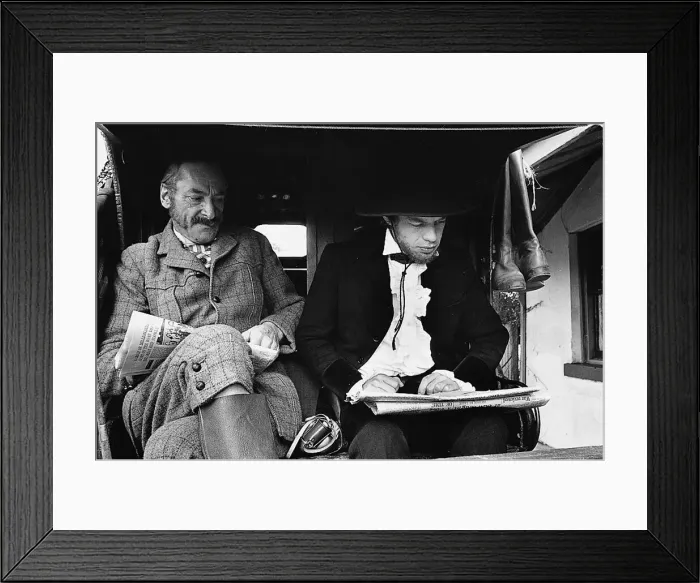 Framed Print : Rolling Stones: Mick Jagger as Ned Kelly shares a coach with Australian actor Ronald Framed Print : Rolling Stones: Mick Jagger as Ned Kelly shares a coach with Australian actor Ronald