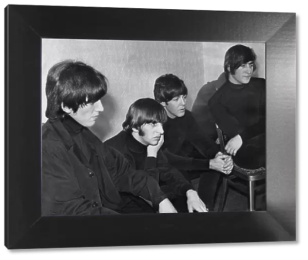 The Beatles backstage - watching themselves on television - at the Odean Cinema