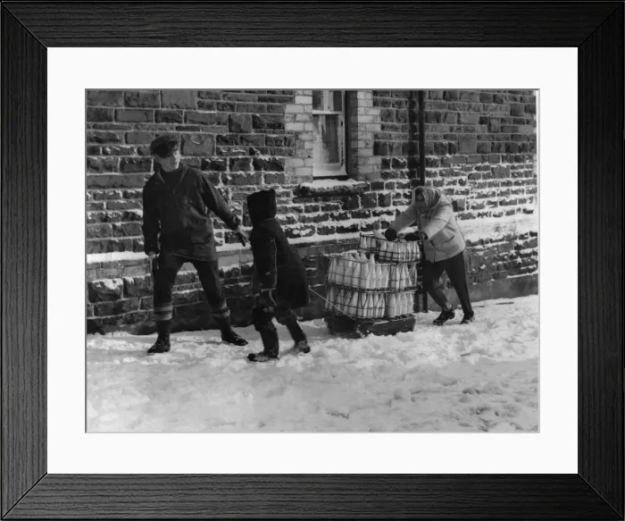 Framed Print : People living in Llanbradach had their milk delivered by sleigh today Framed Print : People living in Llanbradach had their milk delivered by sleigh today