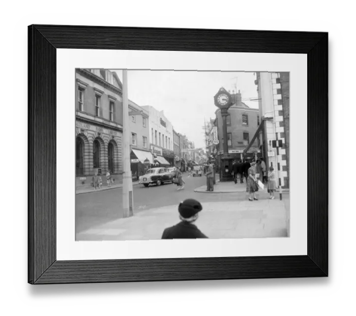 Framed Print : Shoppers and cars mingle on the busy High Street in Stourbridge. 1958 Framed Print : Shoppers and cars mingle on the busy High Street in Stourbridge. 1958