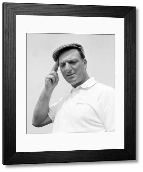 Framed Print : Argentine golfer Roberto de Vicenzo wipes his brow after a good round in the British Framed Print : Argentine golfer Roberto de Vicenzo wipes his brow after a good round in the British