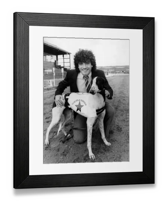 Framed Print : Kevin Keegan with the greyhound named after him Blue Star keegan. Circa 1983