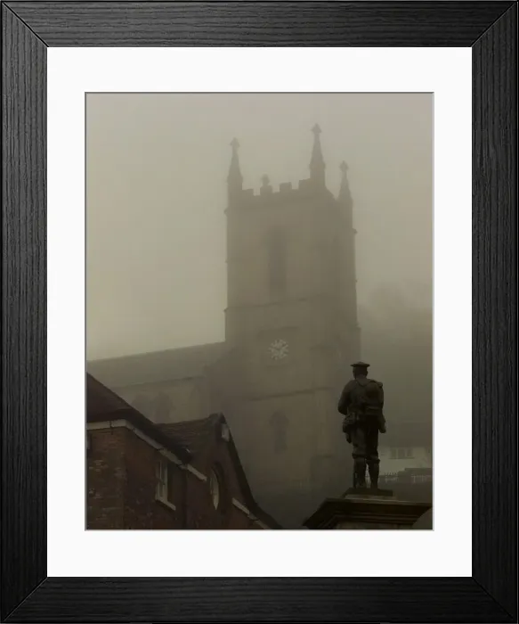 Framed Print : War memorial in Ironbridge. Statue of a soldier shrouded by the fog Framed Print : War memorial in Ironbridge. Statue of a soldier shrouded by the fog
