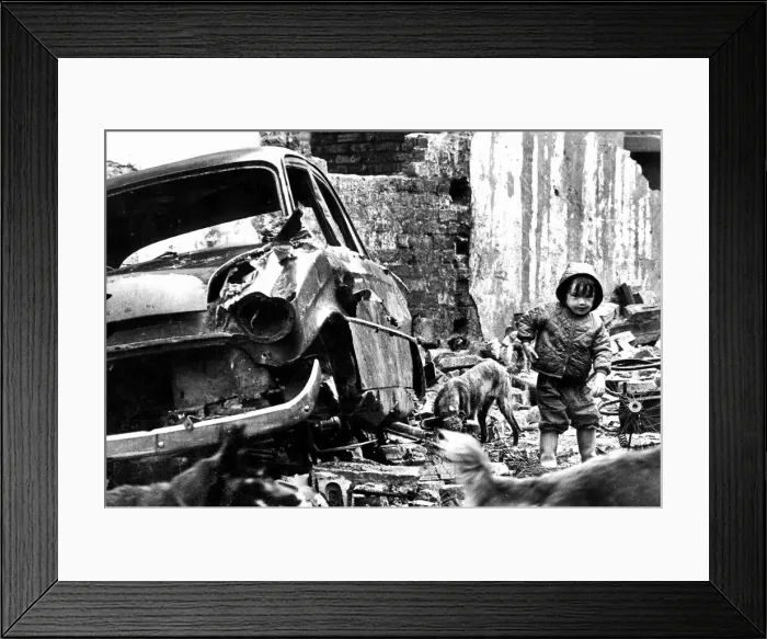 Framed Print : Children playing in the Scotswood area of Newcastle. An abandoned car Framed Print : Children playing in the Scotswood area of Newcastle. An abandoned car