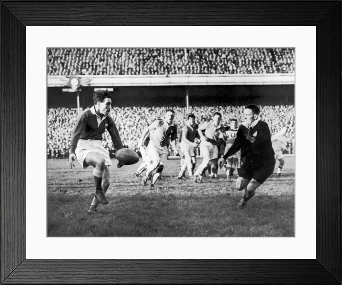 Framed Print : Sport - Rugby - Welsh outside half Cliff Morgan kicks ahead in Wales