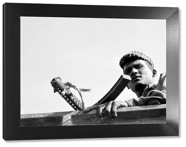 Bangladesh War of Independence 1971 A young soldier stands guard as elements of