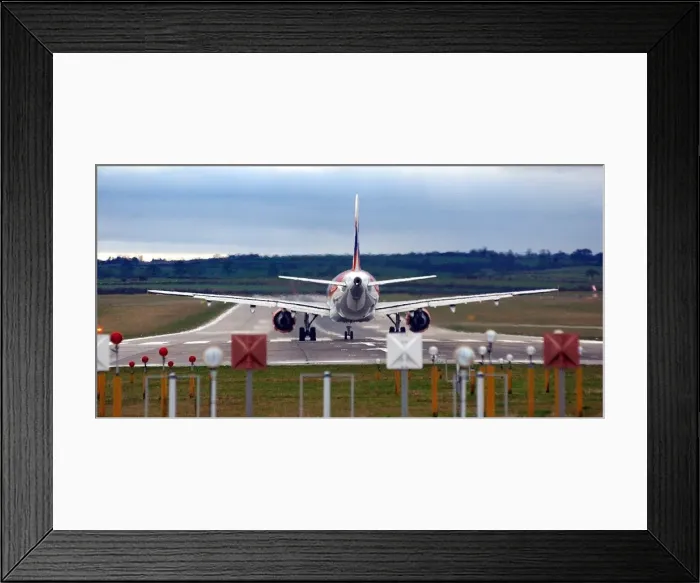 Framed Print : A plane takes off on a runway over Callerton Hill from Newcastle International Airport Framed Print : A plane takes off on a runway over Callerton Hill from Newcastle International Airport