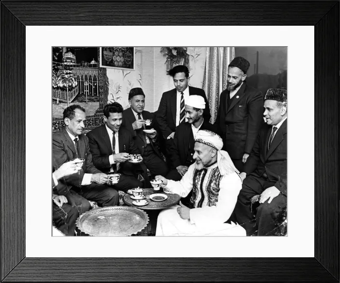 Framed Print : Moslems gather together at Loudon Square, Cardiff, before the feast of Ramadan - Left to Framed Print : Moslems gather together at Loudon Square, Cardiff, before the feast of Ramadan - Left to