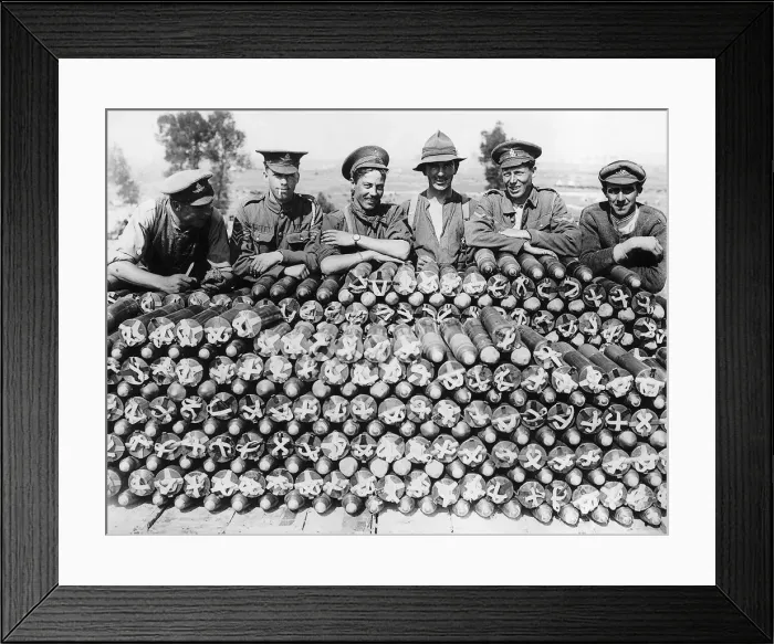 Framed Print : Soldiers from Britain and the Empire leaning of a large pile of 18 pounder shells during