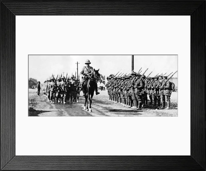 Framed Print : Troops from a Lancashire Regiment led by their commanding officer on horseback pass an Framed Print : Troops from a Lancashire Regiment led by their commanding officer on horseback pass an