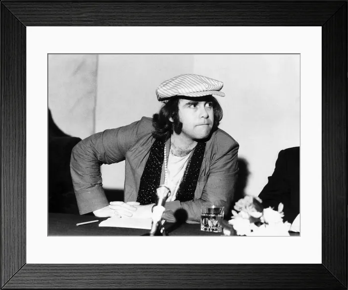 Framed Print : Elton John the singer after returning from his tour of Russia June 1979 Framed Print : Elton John the singer after returning from his tour of Russia June 1979
