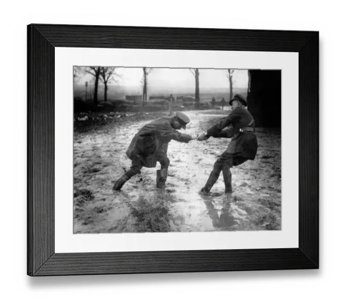 Framed Print : World War One. A British officer helps a fellow officer who Framed Print : World War One. A British officer helps a fellow officer who