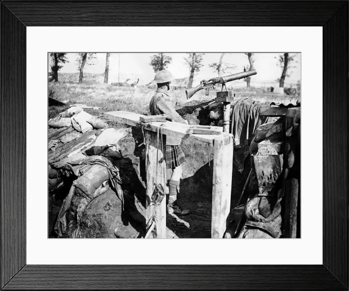 Framed Print : Scottish machine gunner keeps watch from a front line trench 1917 Framed Print : Scottish machine gunner keeps watch from a front line trench 1917