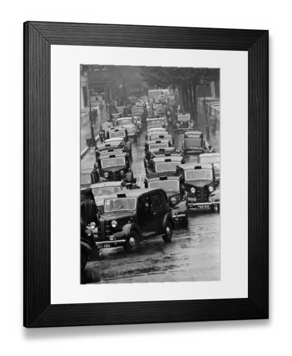 Framed Print : Congestion around a wet Earls Court in London where the 1959 Motor Show is taking place Framed Print : Congestion around a wet Earls Court in London where the 1959 Motor Show is taking place