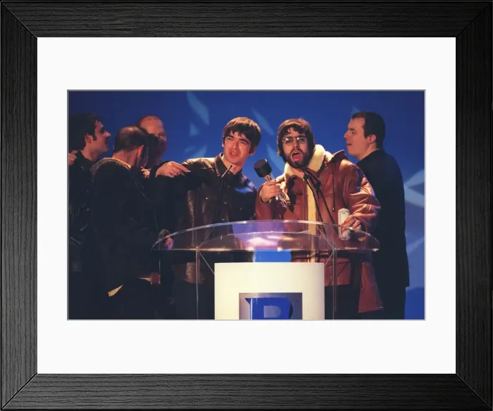 Framed Print : Oasis at the Brit Awards 1996 collecting one of their awards Framed Print : Oasis at the Brit Awards 1996 collecting one of their awards
